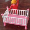 Cuna para casa de muñecas
