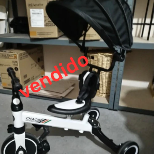 Triciclo ,con capota,muy comodo.